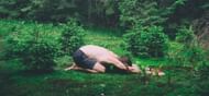 Child’s Pose is another great stretch that targets your upper back and neck. (Photo by Balu Gáspár on Unsplash)